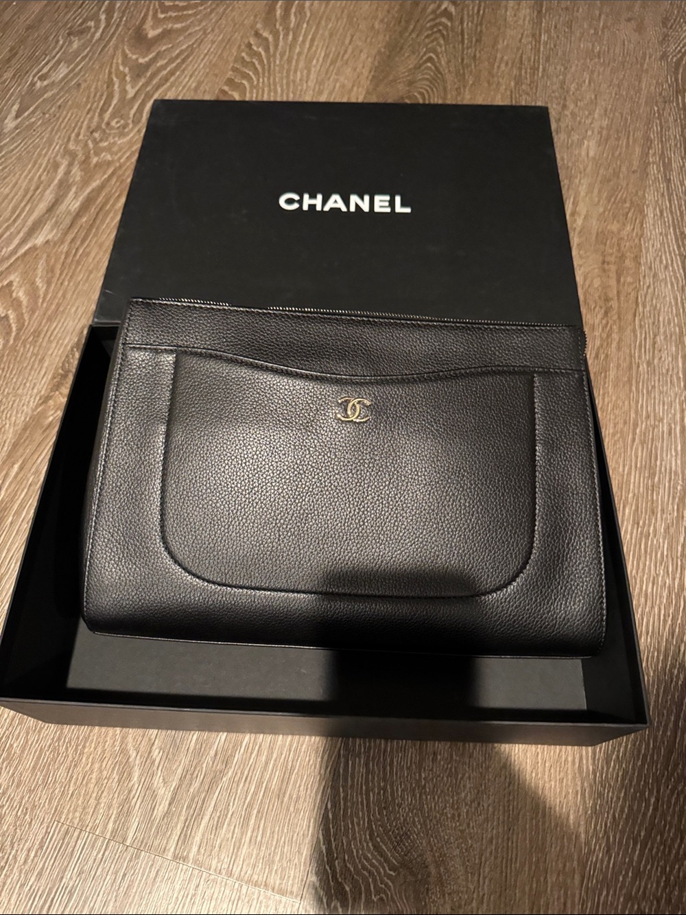 CHANEL women Black Leather Pouch with Gold CC Emblem